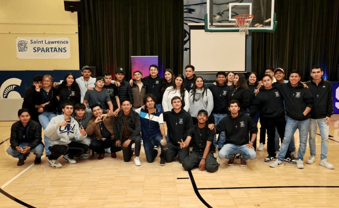 Group photo of young people in a gymnasium
